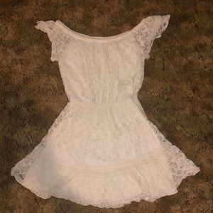 White off the shoulder dress.